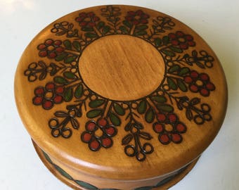 Hand carved wooden circle box from Poland for jewelry or home decor storage trinket box. Gold, brown, green, red