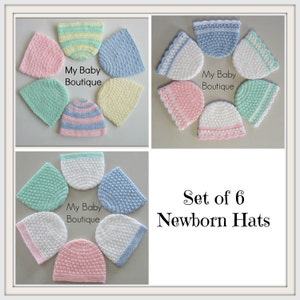 May include: Set of six newborn hats in various colors and patterns, including pink, blue, white, and green. The hats are crocheted and have different textures and trims. The image includes the text "My Baby Boutique" and "Set of 6 Newborn Hats".