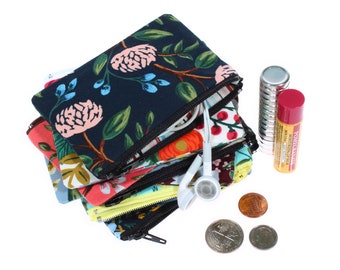 Mini estuche con cremallera y estampado floral: ideal para tarjetas, monedas, dispositivos electrónicos, joyas y auriculares.