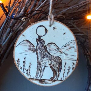Howling Lone Wolf with moon