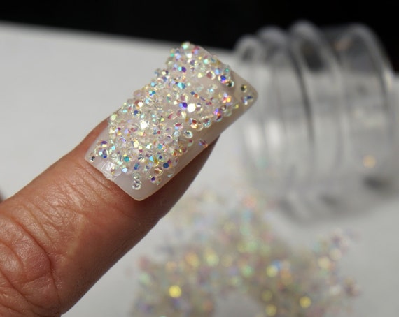 Swarovski crystals pixie application. Coffin shape nails infill