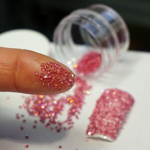 Pink nail crystals.