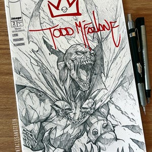 May include: Comic book cover featuring a detailed pencil drawing of a demonic figure with a crown and skull imagery. The cover includes the text "Todd McFarlane" in red, along with issue details and the word "Image".