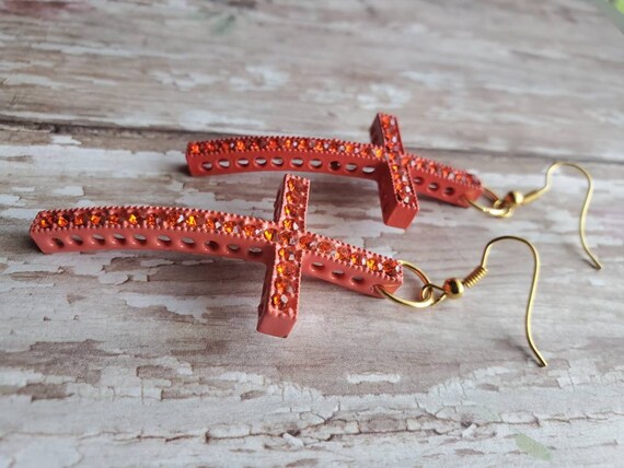 Red cross earrings deals