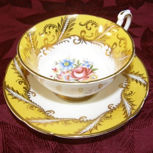 PARAGON TEA CUP And Saucer Yellow & Gold with Floral Pattern