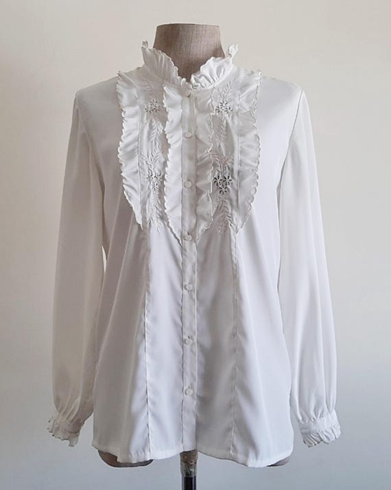 meer. MEER. whip ruffle blouse ホワイト meer. MEER. whip ruffle blouse ホワイト BIG RIBBON RUFFLE
