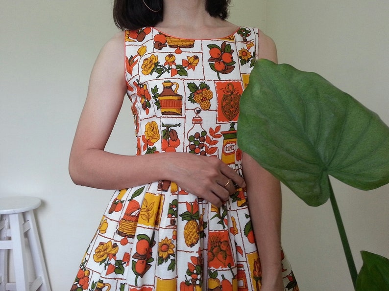 white and orange floral dress