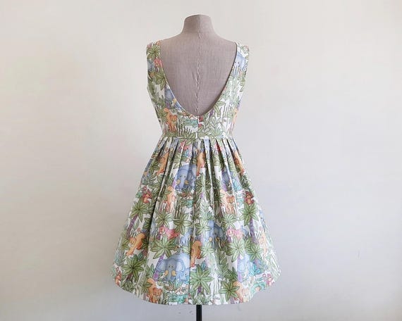 green and white animal print dress Give Your All Green Leopard Dress – Shop the Mint main image 0