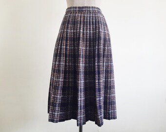 ALAÏA: Jupe midi tube bleue à rayures | France