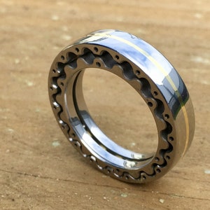 Cycloid Ring - epicyclic gears that rotate in a soothing kinetic motion.