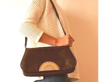 MARIA ELENA, Italy, 80s brown soft leather bag, metal decoration, rectangular, smooth edges, adjustable shoulder strap. Excellent condition.