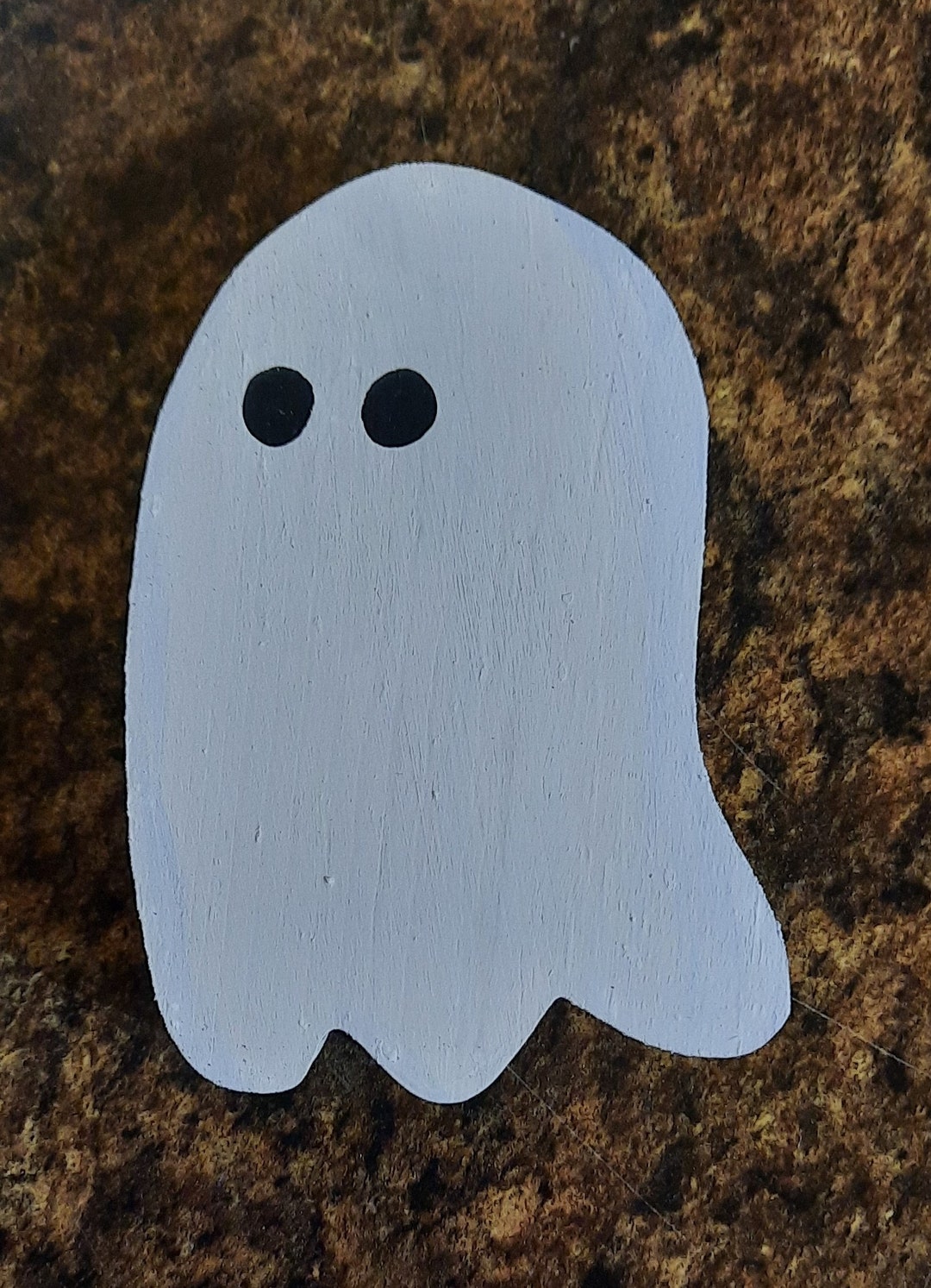 6. Spine-Chilling Silhouettes: Wooden Ghost Cutouts For A Haunted Atmosphere