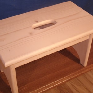 9" Wooden step stool with hand hole , unfinished unfinished pine 9" tall,  16" long, wooden bench, bathroom stool