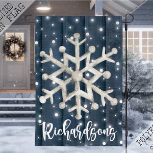 May include: A blue and white garden flag with a snowflake design and the text "Richardsons" in white. The flag is 12x18 inches and is made of polyester or sparkle.
