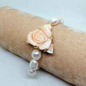 Bracelet with rose on sardonic shell.
