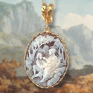 Cameo pendant with bucolic scene and gold plated silver setting.