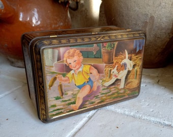 French vintage illustrated storage tin with young boy and dog, vintage tin collection, keepsake tin box