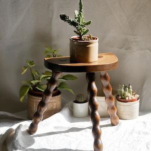 French vintage wooden stool with three turned wooden legs