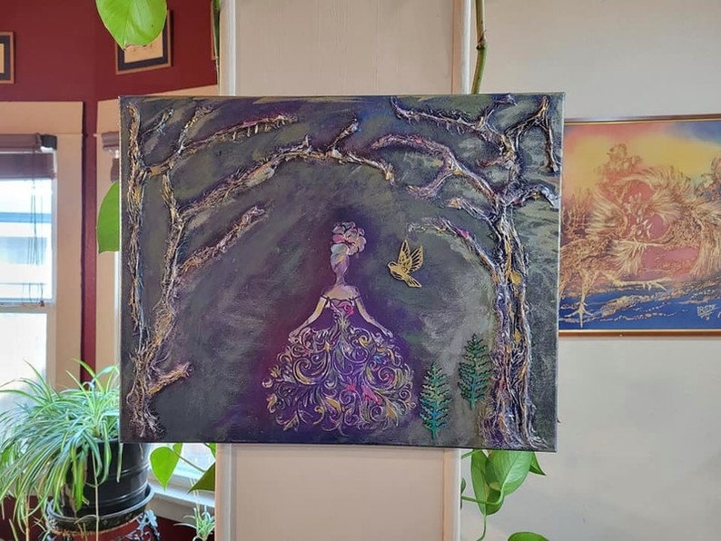 May include: A painting of a woman in a purple and gold dress standing in a forest. The woman is surrounded by trees and a bird is flying above her. The painting has a textured, 3D effect.