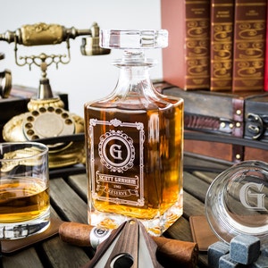 Personalized whiskey decanter with optional whiskey glasses and stones.