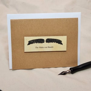 Die Make-out Bandit - Moustache Notizkarte