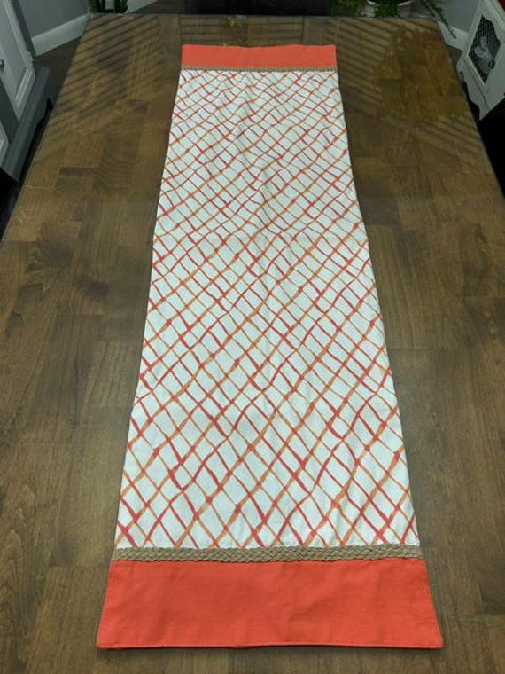 Fall : Orange and white Diamond pattern table runner  46'' by 13 and 1/2'' - pre-owned - like new condition .