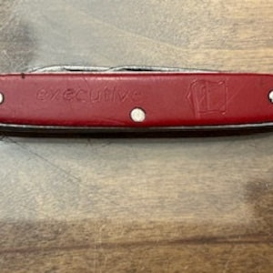 Pocket Knife : Small Red Handle 2 blade pocket knife .