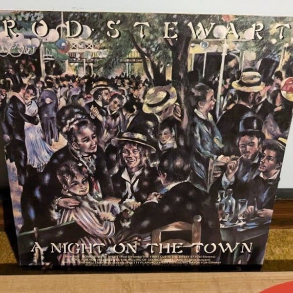 Rod Stewart at night on the town vinyl record album