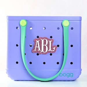 Monogram boggy button Custom Tote Bag Charm attached to a bogg bag with pink glitter boggy button
