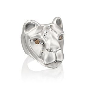 White lioness ring with royal diamond setting