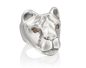 White lioness ring with royal diamond setting