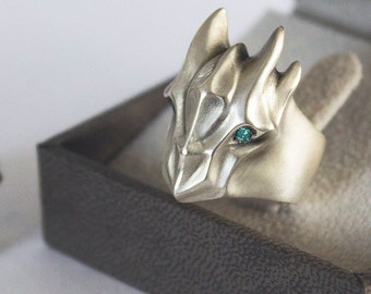 Dragon ring with blue diamond eyes