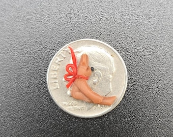 micro bear with red bow