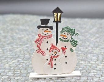 Arte de jardín familiar de nieve