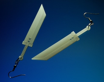 May include: A pair of white sword-shaped earrings with silver hooks. The swords are about 3 inches long.