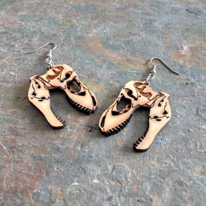 thumbnail interactive-video image 1 of Retro Chic 3D Dinosaur Skeleton Earrings - Gold Or Silver Plated - T-Rex/Raptor 1 of 5