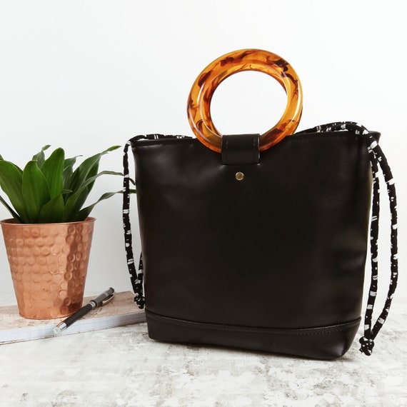 bag with round handle