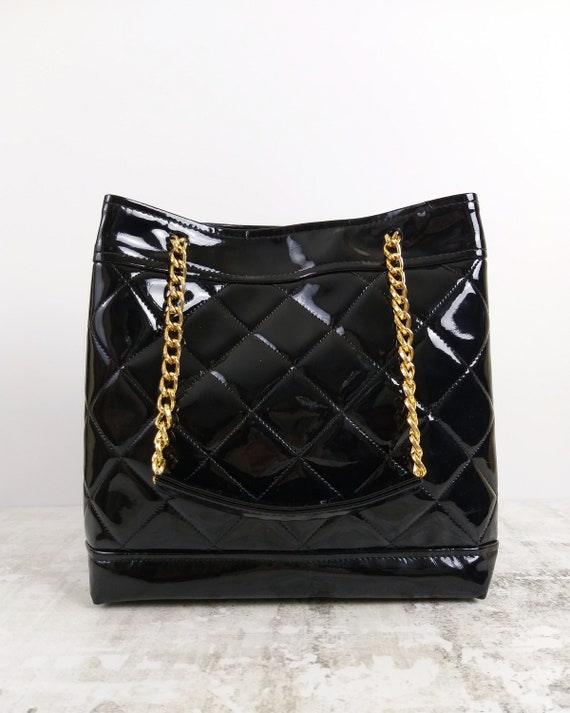 black bag with gold chain strap