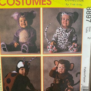 May include: McCall's Costumes pattern showing four baby costumes: a koala, a Dalmatian, a ladybug, and a monkey. The costumes are shown on babies. The pattern number is 8897, size 2.