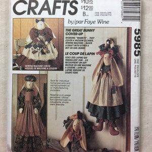 May include: McCall's Crafts pattern envelope featuring bunny-themed sewing projects. The cover showcases various bunny designs, including covers for sewing machines and vacuum cleaners, and draft blockers. The text includes "The Great Bunny Cover-Up".