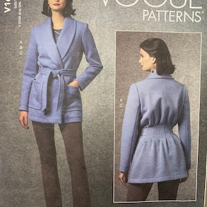 May include: Vogue Patterns sewing pattern V1663. The pattern features a light blue wrap jacket with a tie belt and pockets. The pattern also includes a view of the jacket's back. The pattern is designed by Kathryn Brenne.