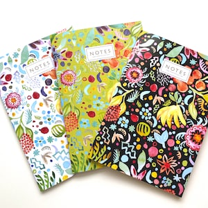 Juego de 3 cuadernos A5 con diseño floral y frutas
