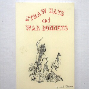 Puede incluir: Una portada de libro vintage con el título "STRAW HATS and WAR BONNETS" en letras rojas. La portada presenta una ilustración en blanco y negro de una figura nativa americana. El nombre del autor, M.J. Freeman, está en la parte inferior.