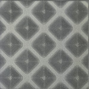 May include: A square gray tile featuring a repeating pattern of raised, concentric diamond shapes. The surface has a textured finish with a grid of intersecting lines that create a geometric, three-dimensional effect across the entire piece.