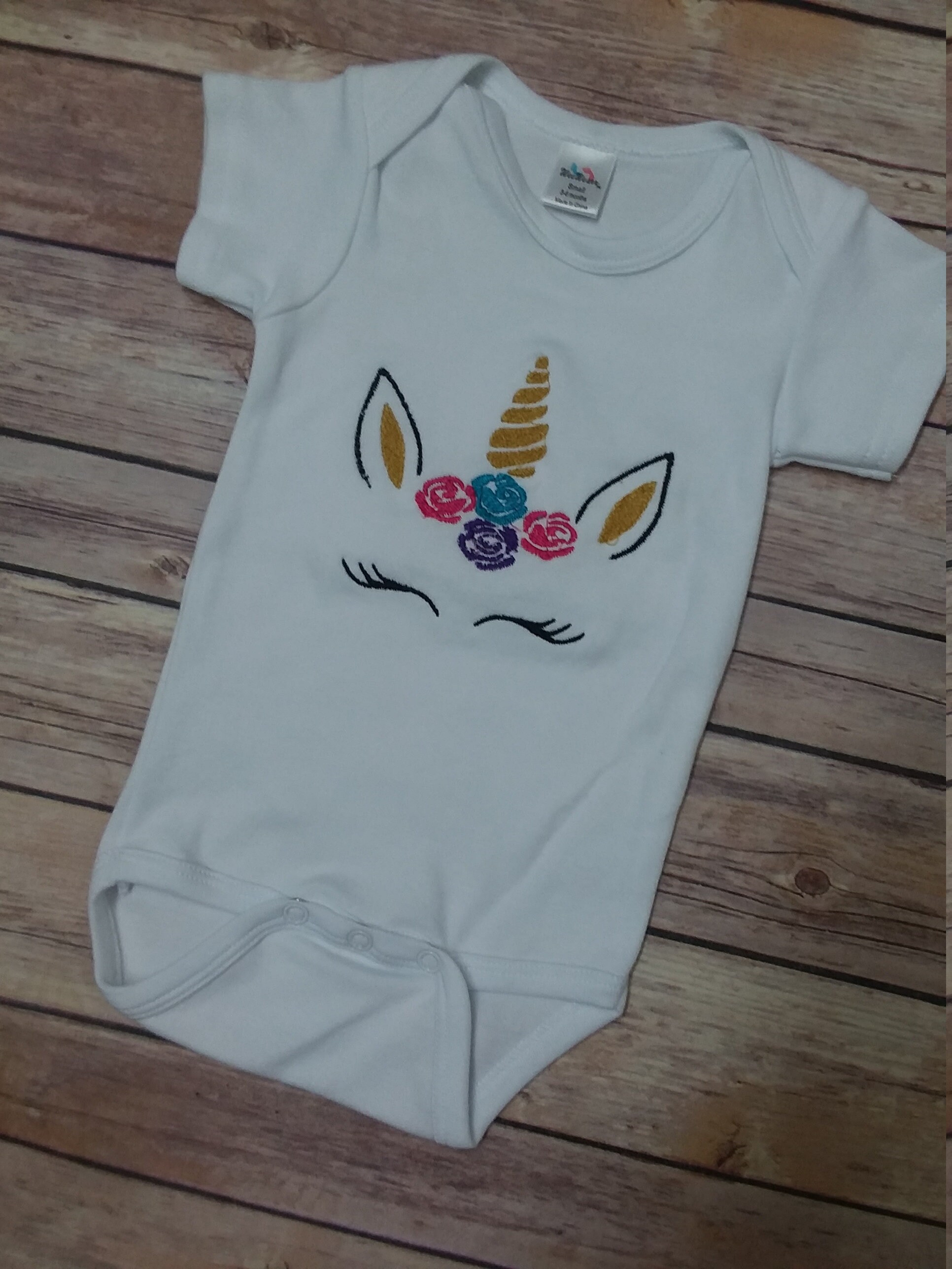 unicorn onesie baby girl