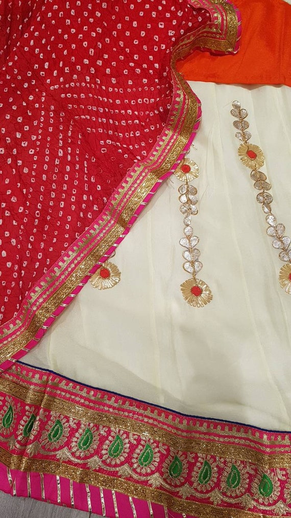 pink and off white lehenga choli