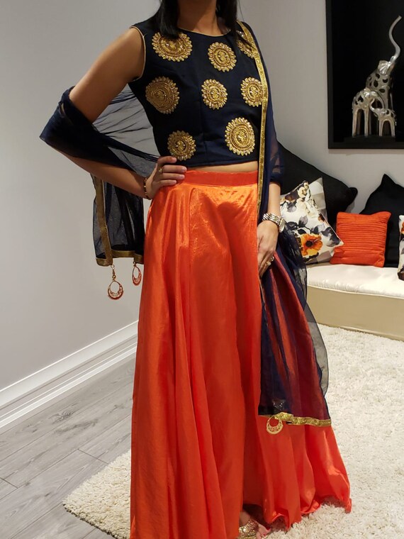 top for orange long skirt