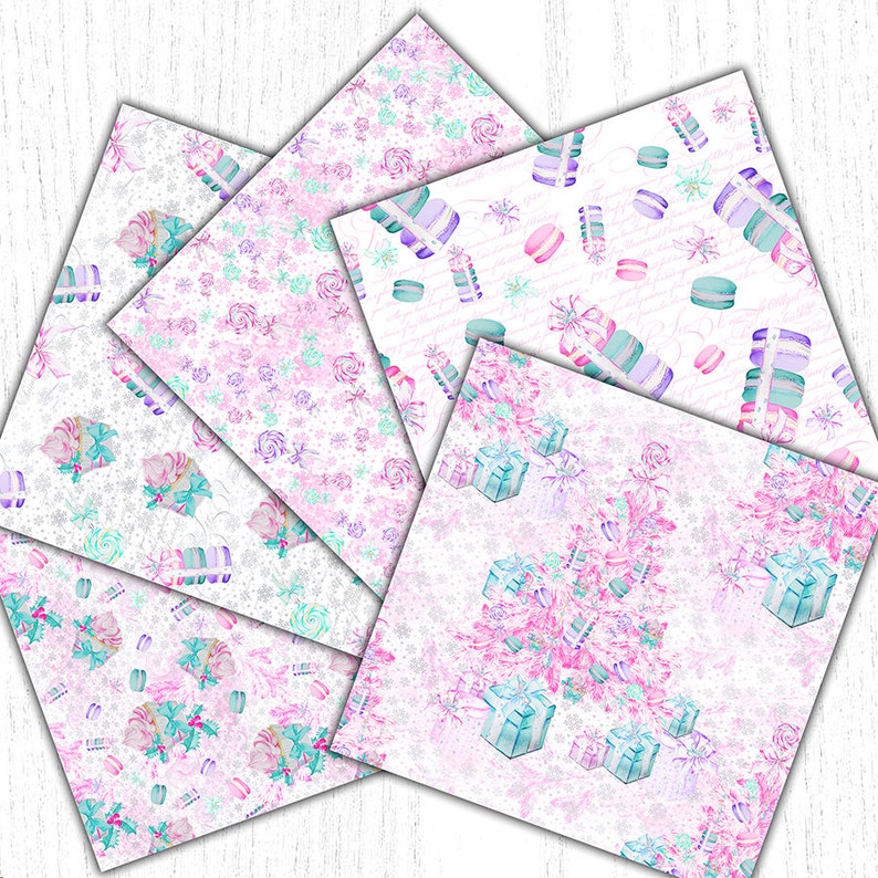 May include: A set of five digital paper designs featuring a watercolor style with pink, blue, and white colors. The designs include a pattern of snowflakes, presents, and macarons.