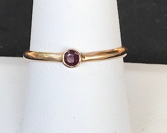 14k gold ruby ring.