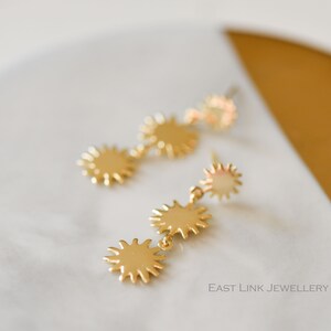 Dainty gold plated sterling silver earrings triple sun earrings drop earrings by East Link Jewellery